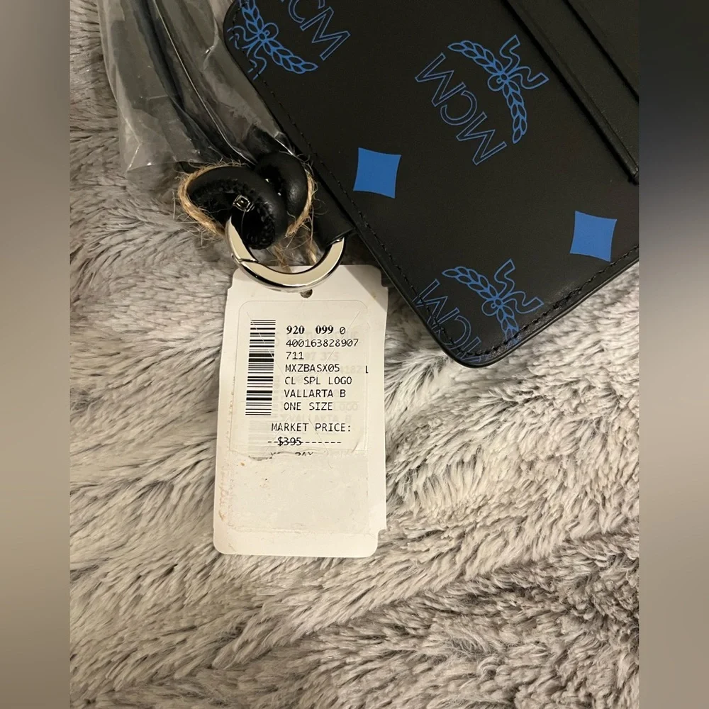NEW NWT MCM LOGO PHONE LANYARD VALLARTA BLUE BLACK AUTHENTIC INCL SAKS TAG